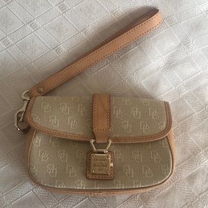 Authentic Dooney and Bourke wristlet clutch